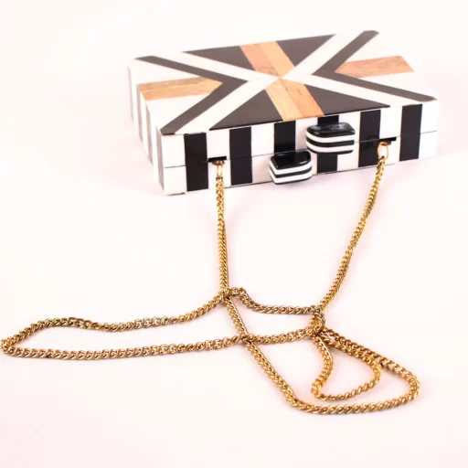 The Snowy Walnut Clutch by REHMAN CRAFT